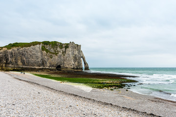 Wall Mural - The beach and stone cliffs in Etretat, France