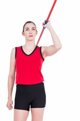 Wall Mural - Female athlete throwing a javelin