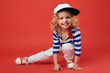 © VITALII SMULSKYI - Portrait of a cute little girl in fashionable clothes. beautiful child