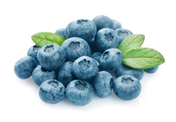 Wall Mural - Heap of blueberries with leaves isolated on white background