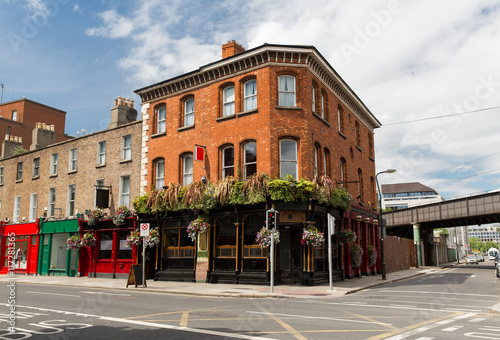 Stampe building with bar or pub on street of Dublin city