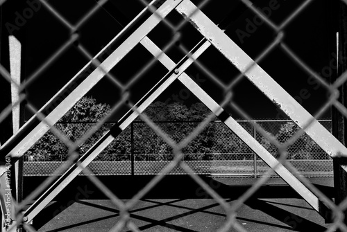 Fotografie, Obraz Outdoor chain link fence with steel beam background