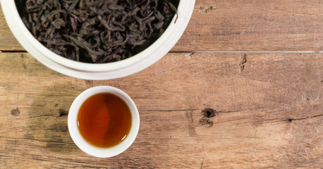 Wall Mural - Chinese tea on wooden table, flat lay, top view, copy space