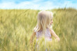 © Africa Studio - Little blonde girl in the field
