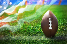 American Football On Field And American Flag Background