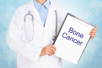 Doctor holding clipboard with bone cancer text on a sheet of paper. on white background