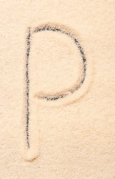 P letter written on sand