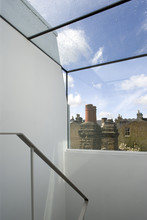 Handrail With View Out Towards Chimneys From A Victorian House