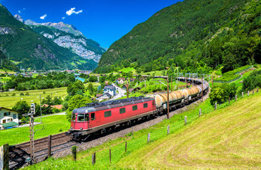 Wall Mural - Freight train climbs up the Gotthard railway - Switzerland