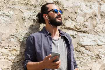 Sticker - man with earphones and smartphone listening music