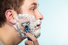 Man Shaving With Razor Face Profile