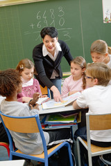 School children in classroom at lesson