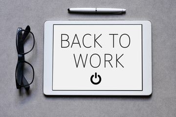 Wall Mural - text back to work in a tablet computer