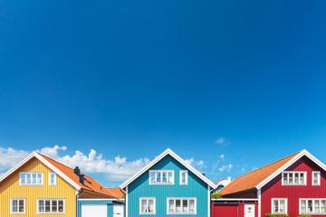 Old swedish houses in front of a blue sky