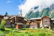 Sun-burnt Chalets, Green Forests And Meadows In Valais, Tradition Swiss  .Alps Village  Blatten