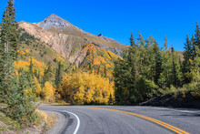 Highway In Colorado Mountains In Autumn
