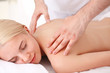 © Africa Studio - Young woman getting back massage