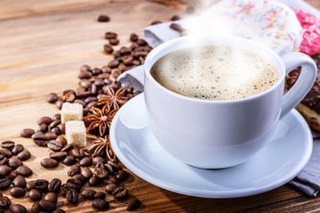 Wall Mural - white mug grain coffee and donuts on a wooden background