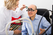 © JackF - Optician doing eye check up