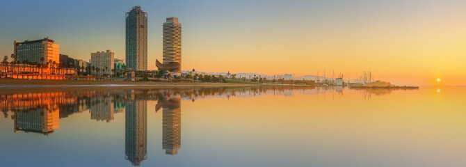 Wall Mural - barceloneta beach in barcelona at sunrise