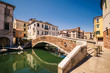 Typical bridge across a canal in Chioggia, Venice, Italy.