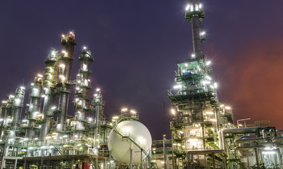 petrochemical plant column tower twilight