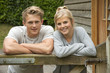 © petert2 - Portrait of a teenage couple leaning on a gate