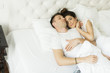 © BGStock72 - Young couple in bed