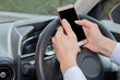 © twinsterphoto - Businessman texting, chatting, playing on phone while careless driving