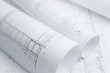 © worldwide_stock - architectural drawing paper rolls of a dwelling for construction