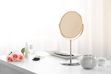Round Mirror On White Dressing Table