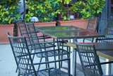 Fototapeta Boho - tables at an outdoor cafe