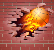 Flaming Basketball Ball Breaking Through Brick Wall