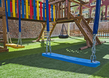 Childrens Outdoor Play Area With Swings