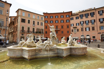 Wall Mural - fountain of Neptune, in colorful Piazza Navona, Roma, Italy