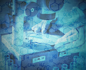 Wall Mural - scientist working with microscope