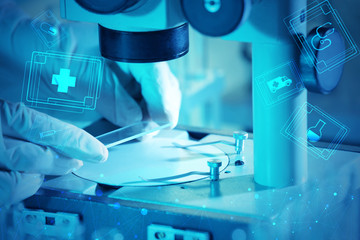 Wall Mural - scientist working with microscope. medical technology concept
