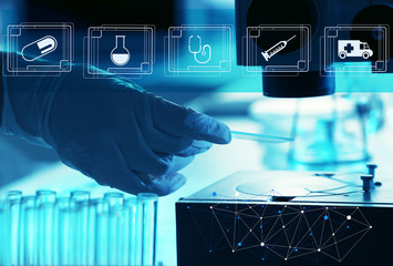 Wall Mural - scientist working with microscope. medical technology concept