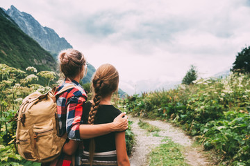 Wall Mural - hikers walking to mountains