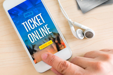 Poster - Hand touch smart phone and ear phone with Ticket online word on
