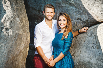 Nice couple looking at camera and smiling