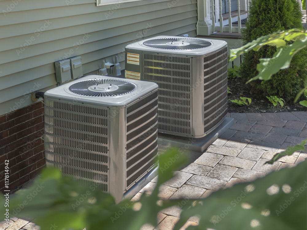 Стоковое фото "HVAC heating and air conditioning residential units or heat pumps
