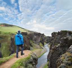 Wall Mural - Tourist standing on the top of the canyon in Iceland