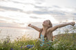© Louis-Paul Photo - Teenager girl at sunset on the side of the sea