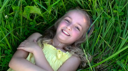 cute girl on grass