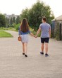 © st_fox - young couple holding hands