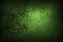 Green Grunge Concrete Stone Wall Background. Dark Edges