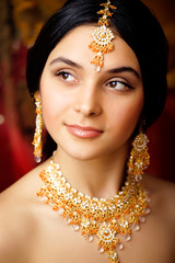 beauty sweet real indian girl in sari smiling on black background