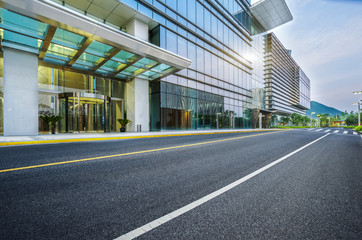 Poster - city empty traffic road with cityscape in background