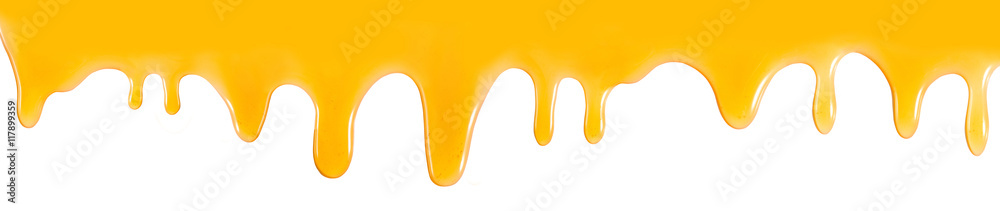 Isolated image of flowing honey closeup - obrazy, fototapety, plakaty 